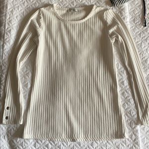 Fits more like a small to medium.